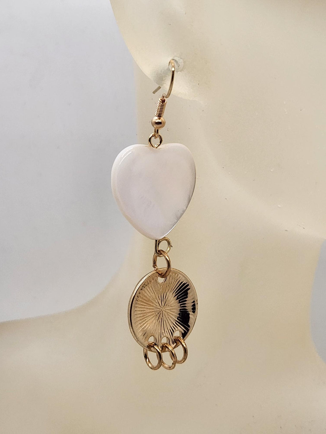 Artisan heart shell with gold tone dimpled circle earrings