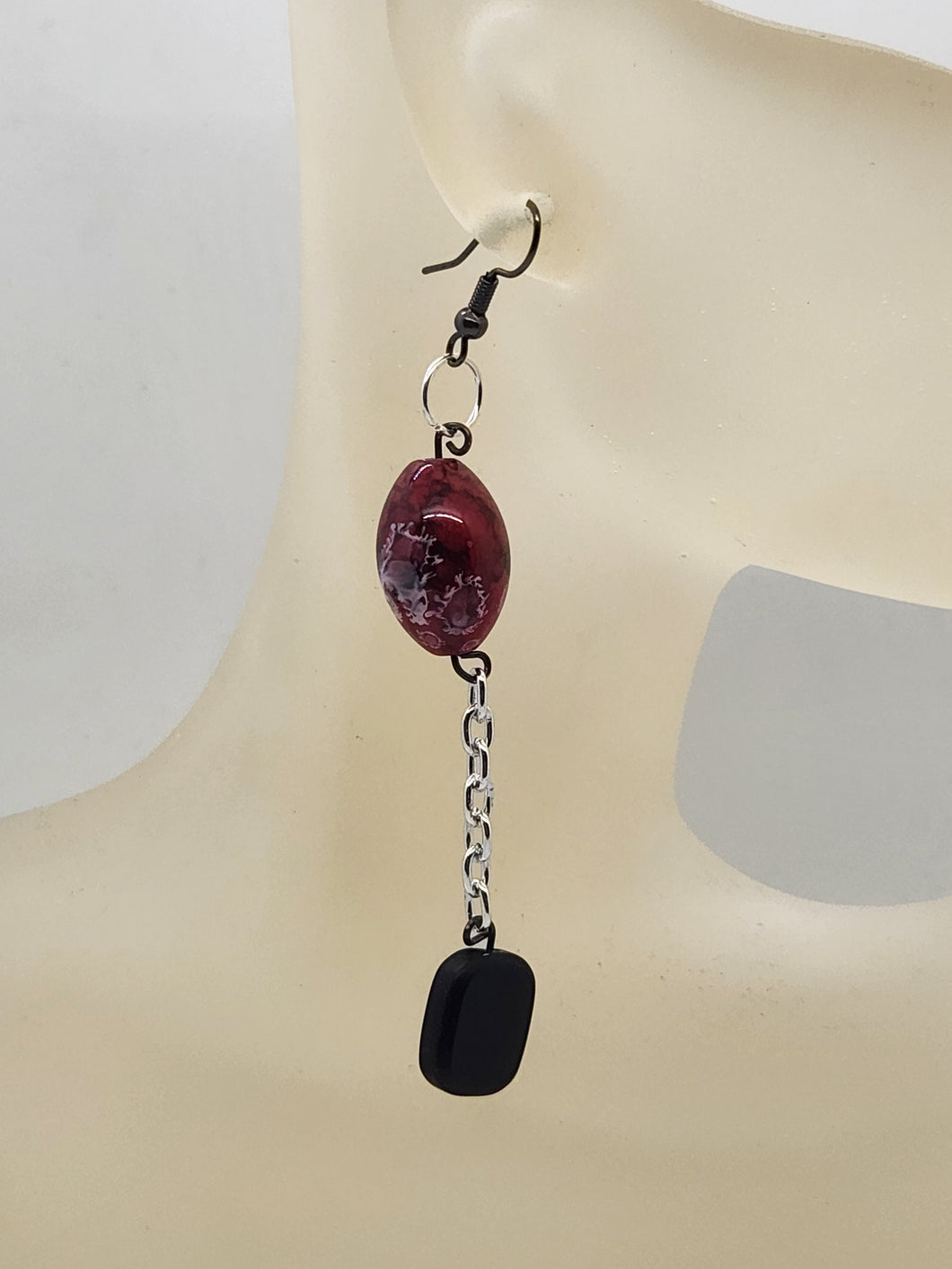 Artisan speckled red glass bead with black stone dangle earrings