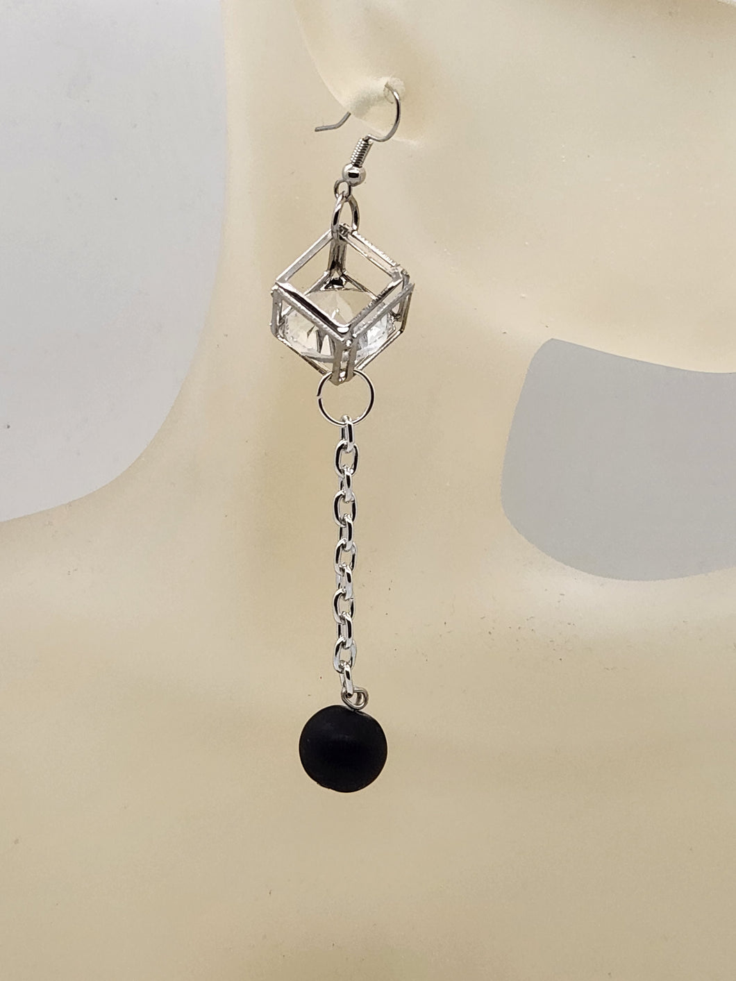 Artisan caged diamond with black stone dangle earrings